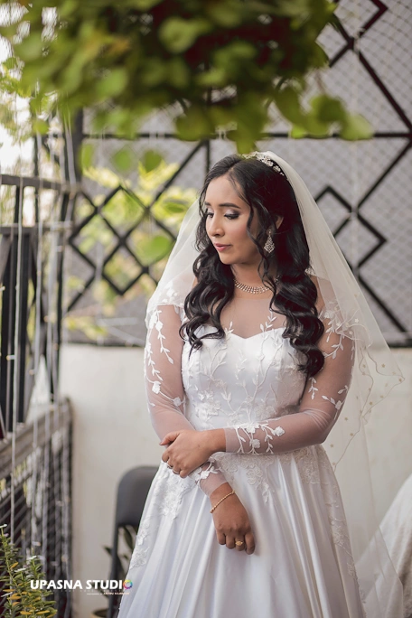 bride standing posing in balcony shoot by upasna studio wedding photographer in delhi 